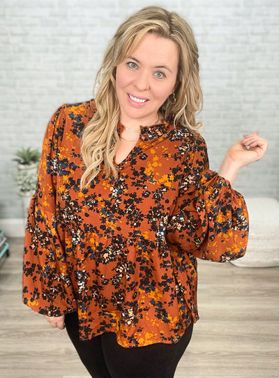 Sense Of Belonging Floral Babydoll Blouse In Rust