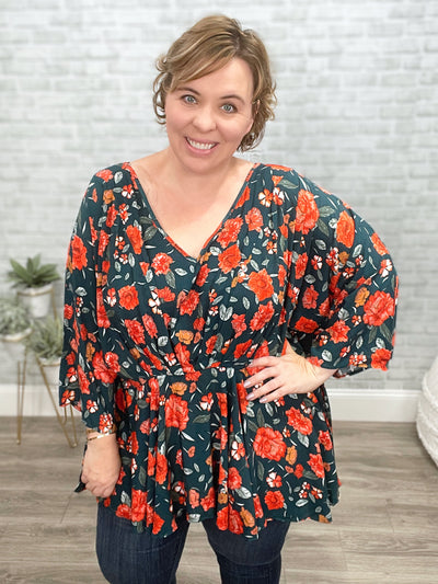On To the Next Vibe Peplum Floral Blouse