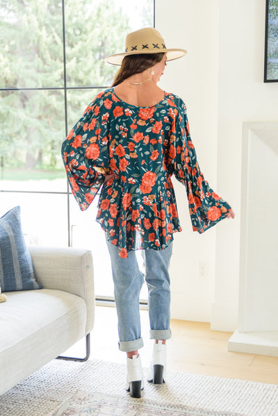 On To the Next Vibe Peplum Floral Blouse