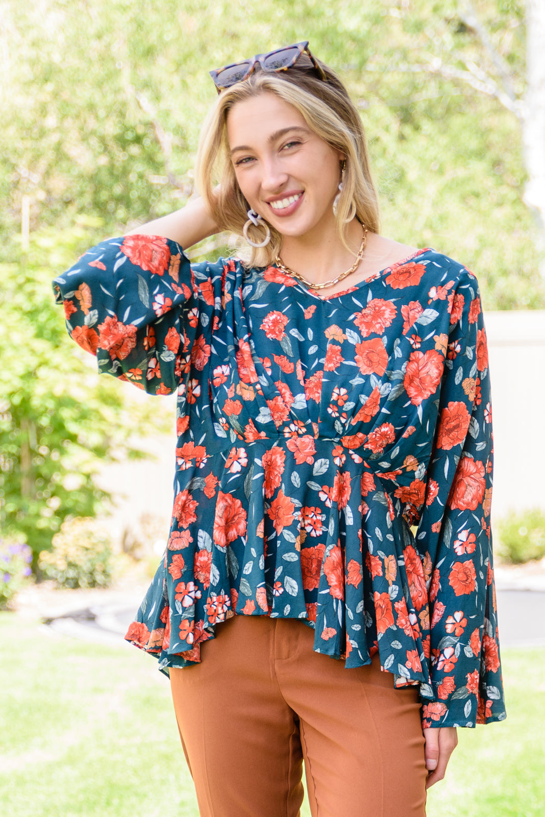 On To the Next Vibe Peplum Floral Blouse