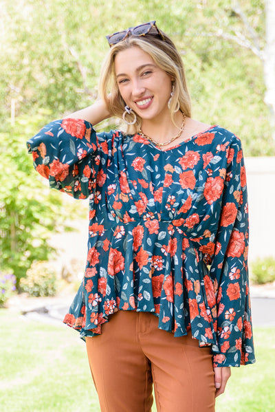 On To the Next Vibe Peplum Floral Blouse