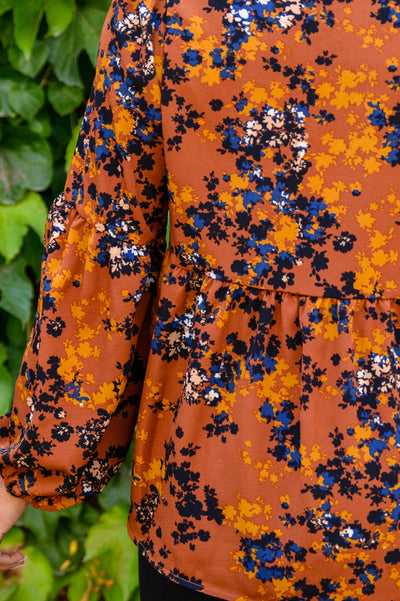 Sense Of Belonging Floral Babydoll Blouse In Rust