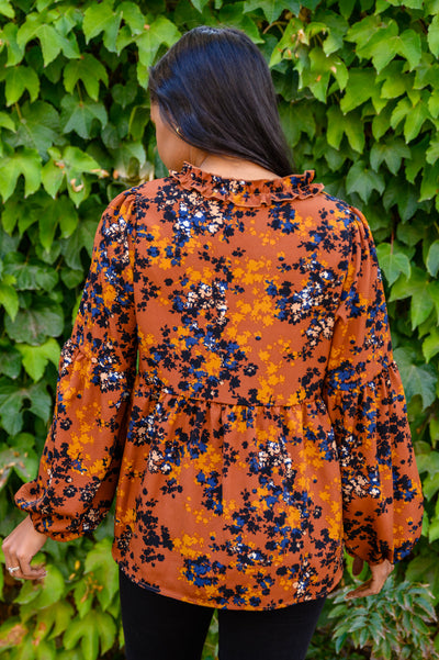 Sense Of Belonging Floral Babydoll Blouse In Rust